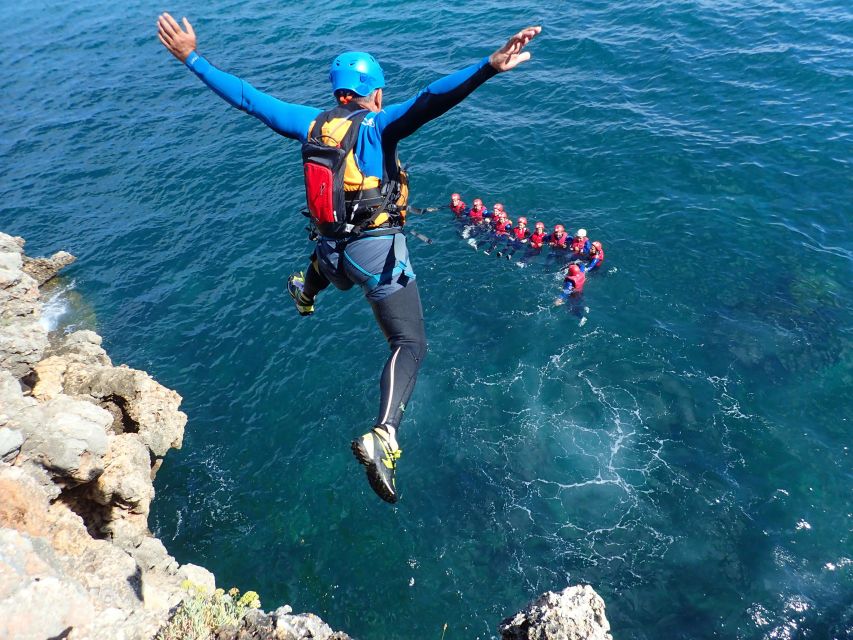 Arrábida: Setubal, Sesimbra Coasteering & Speedboat Tour - Swimming through clear water and coastal caves