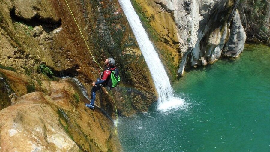 Bolulla: Estret de les Penyes Water Canyoning - The 20-metre waterfall finale