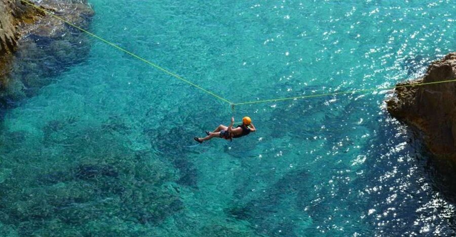 Cagliari: Half-Day Coasteering Experience - Walking through scrub and across rough rock