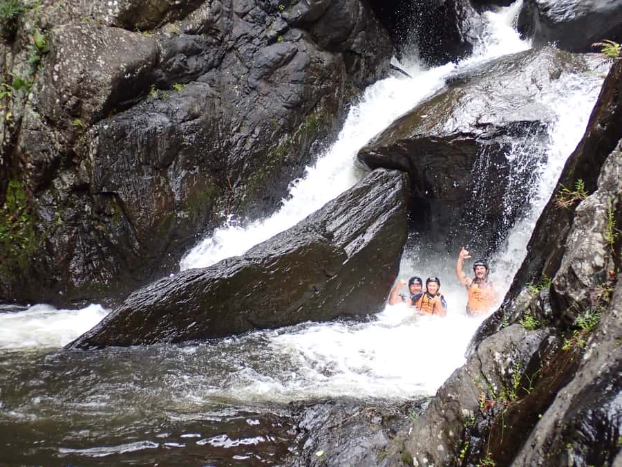 Cairns Full-Day Canyoning Adventure tour - Waterfalls, slides, and natural pools
