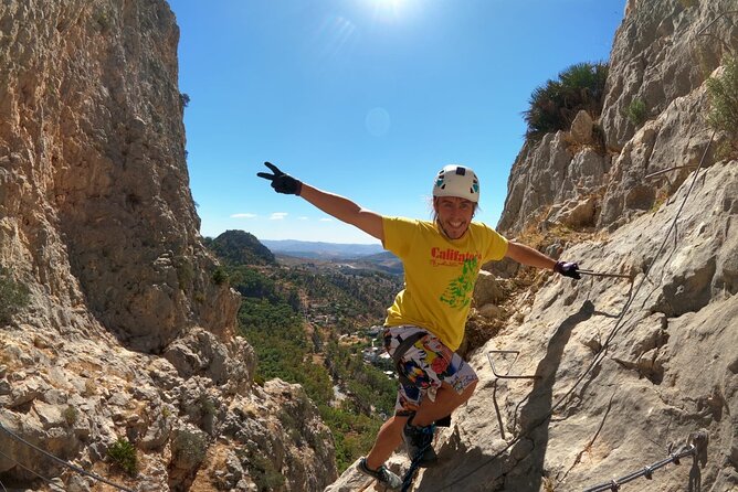 Caminito del Rey - Via Ferrata & Zip Line Adventure - Climbing the steel rungs above the gorge