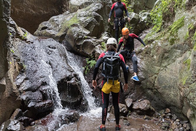 Canyoning with Waterfalls in the Rainforest - Small Groups ツ - Getting fitted with wetsuits, helmets, and rope gear