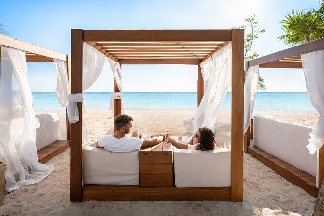 Cozumel: VIP Access Pass at KUZÁ Beach & Adventure Park - Arrival brings a chilled towel and bubbles