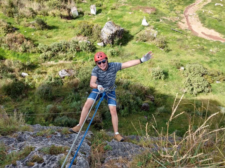 Cusco: Extreme Sky Bike and Rappelling Adventure - A 30-meter rappel down the rock