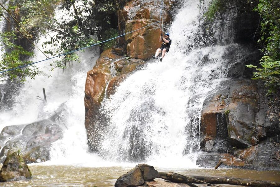 Dalat canyoning tour - Sliding Seven Meters Down a Waterfall