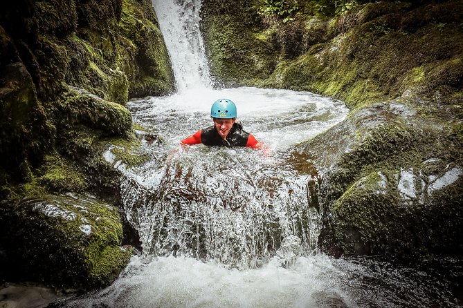 Dollar Falls Canyoning Trip - Jumps, slides, and abseils in Dollar Canyon