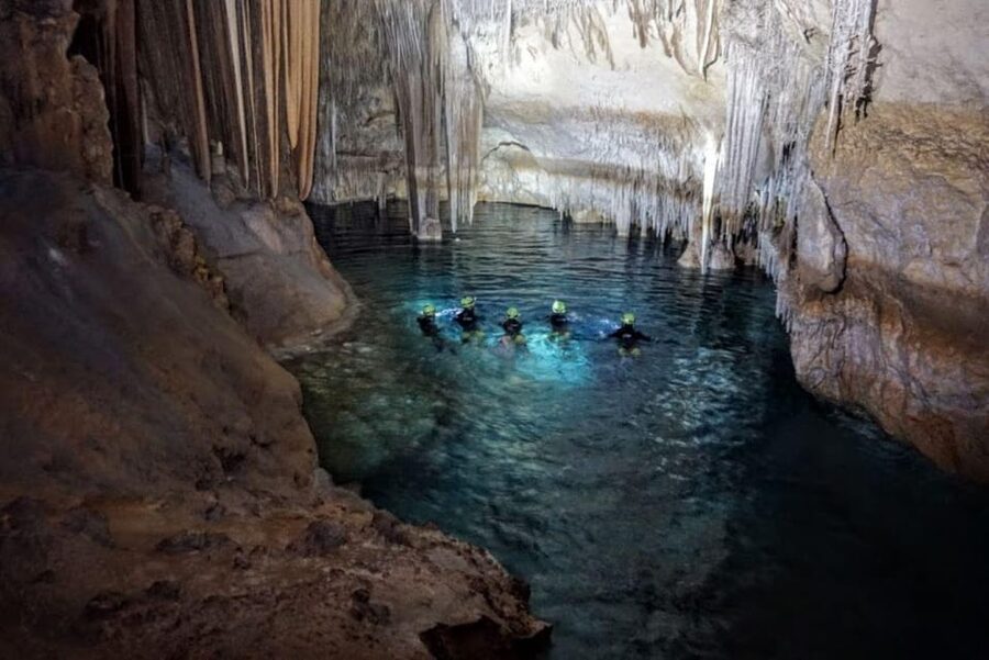 Estany d'en Mas: Coastal Hike, Abseil & Sea Cave Exploration - The 120-meter swim back to the beach