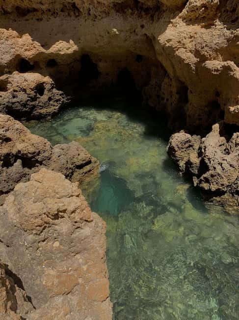 From Faro: Adventure Express Tour - Cliff Jump & Beach - Meeting the gray van near O Seu Café