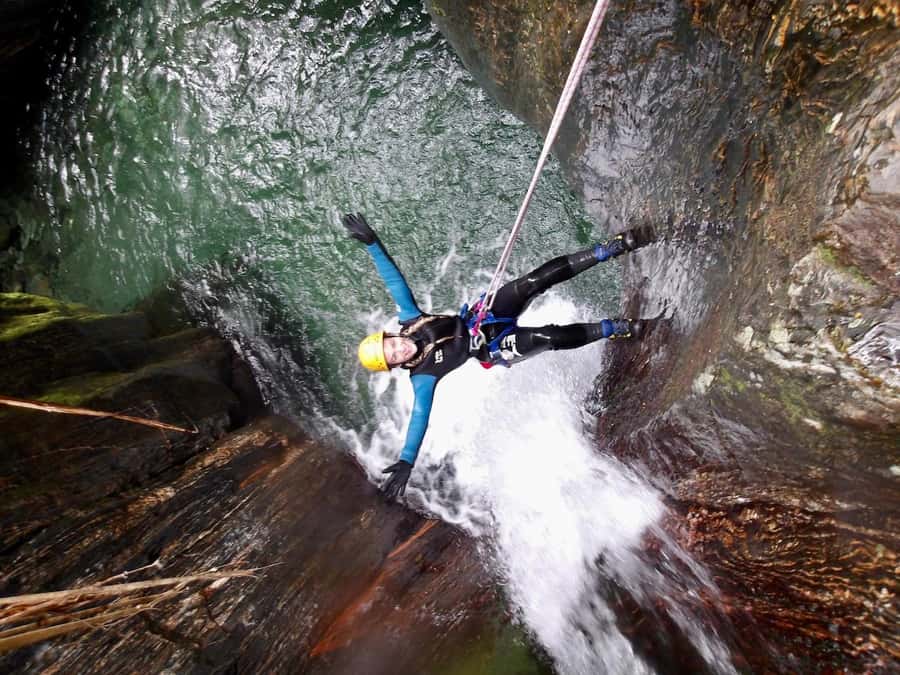 From Queenstown: Mount Aspiring Full-Day Canyoning Adventure - Getting ready for three hours in a wetsuit
