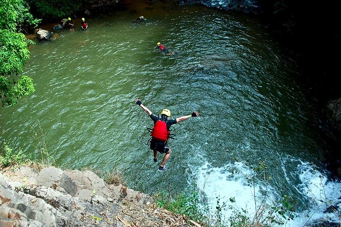 Full Day Canyoning Activity in Da Lat with Lunch - Crossing above the waterfall on the Tyrolean traverse