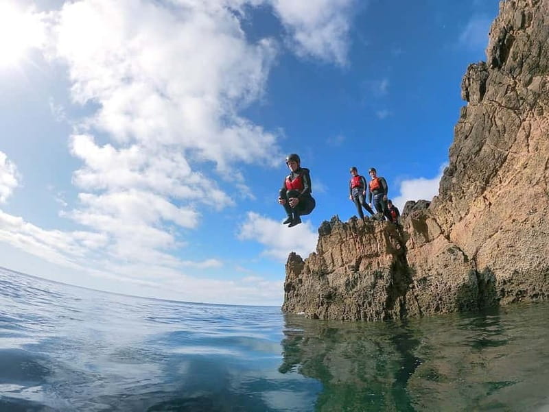 Lagos: Algarve Coasteering and Snorkeling Adventure - Snorkeling in clear water, when conditions allow