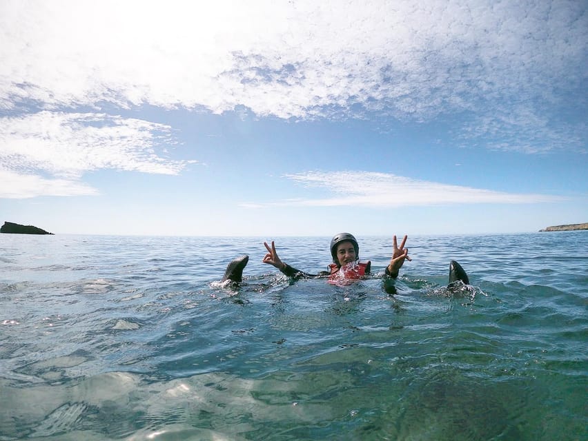 Lagos: Algarve Coasteering and Snorkeling Adventure - The equipment makes the cold water manageable