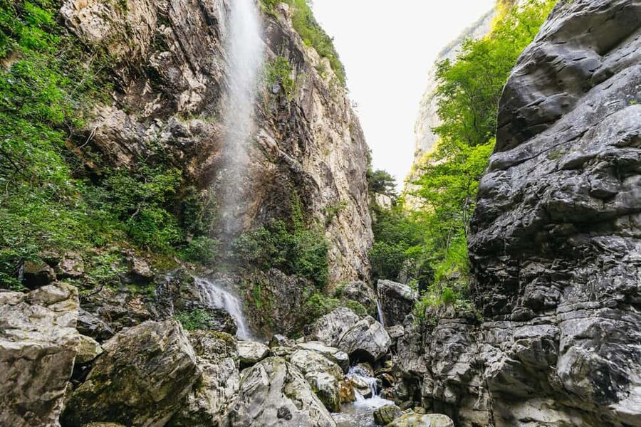 Lake Garda: Family Friendly Canyoning Tour - Ninety minutes of slides, pools, and canyon fun
