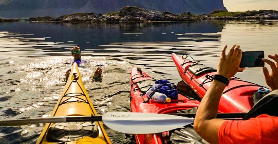 Lofoten: Full Day Combo tour, (kayaking and rappelling) - Starting by the water with a small group