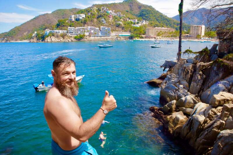 Mismaloya: Snorkeling, Cliff Jumping, and Beach Tour - Cruising around Los Arcos granite islands