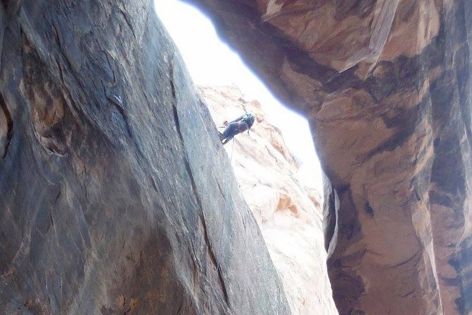 Moab Rappeling Adventure: Medieval Chamber Slot Canyon - First rappel: entering Medieval Chamber