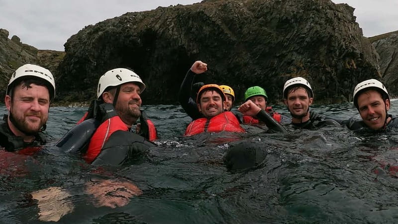 North Wales: Extreme Coasteering with Cliff Climbing & Jumps - The opening swim and first rock routes