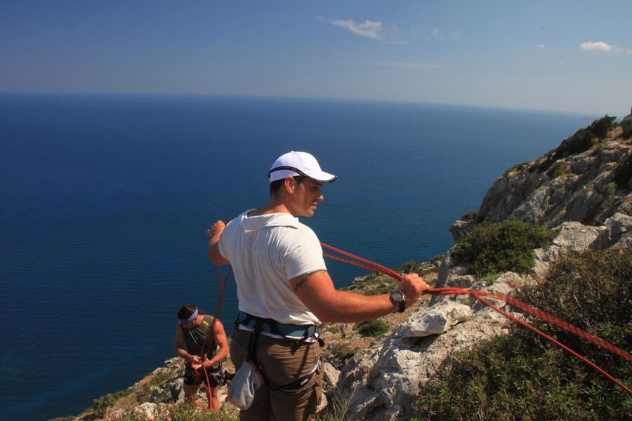 Rhodes: Ladiko Bay Rock Climbing and Rappelling Experience - Cooling off at Ladiko Bay or Anthony Quinn Bay