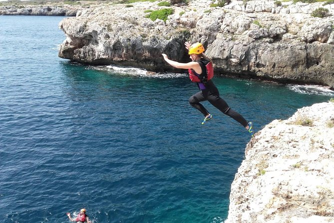 Shore Excursion: Coasteering in Mallorca - Cliff Jumps, Rock Climbing, and a Zip Line