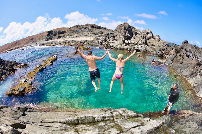 ThrillSeekers: Aruba UTV Tour & Cliff Jump at Natural Pool - Alto Vista Chapel and a quick roadside pause