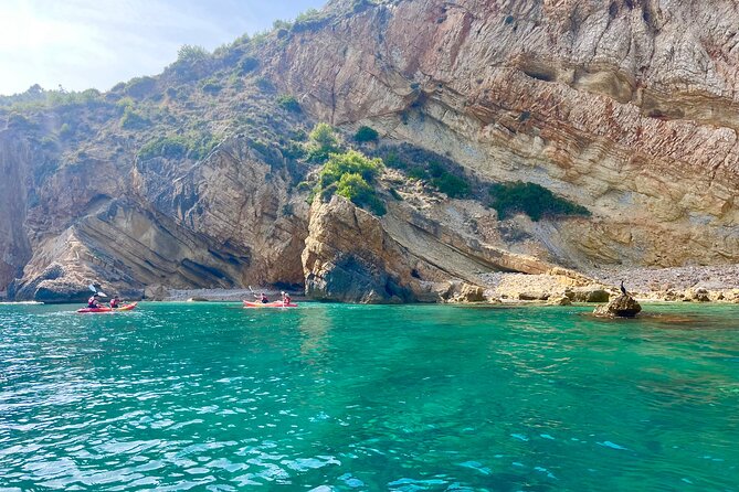 Uncharted Marine Reserve Cave, Snorkel & Cliff Jumping Kayak Tour - Paddling along the coast to the coves